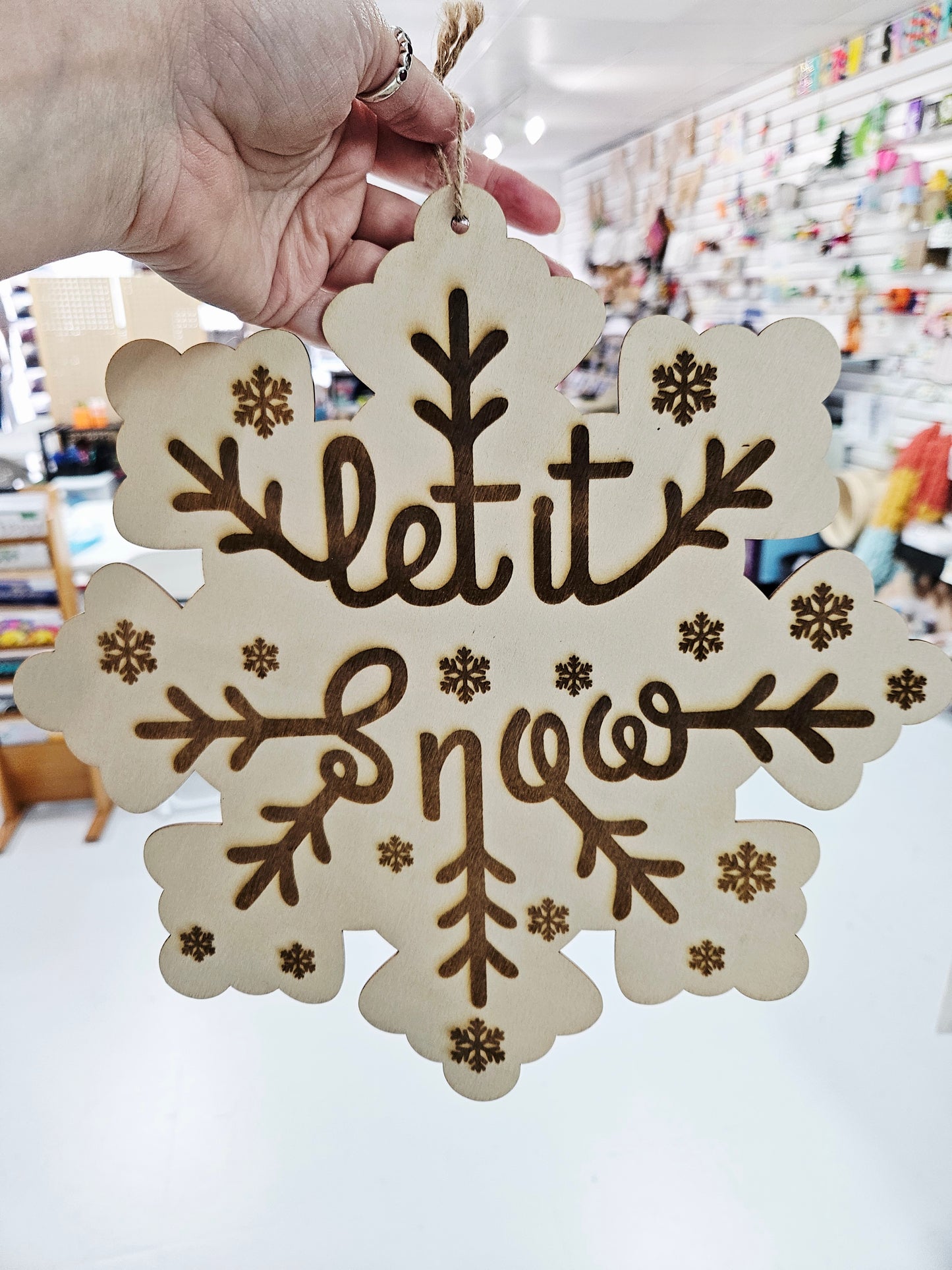 Snowflake Shaped Let It Snow Sign