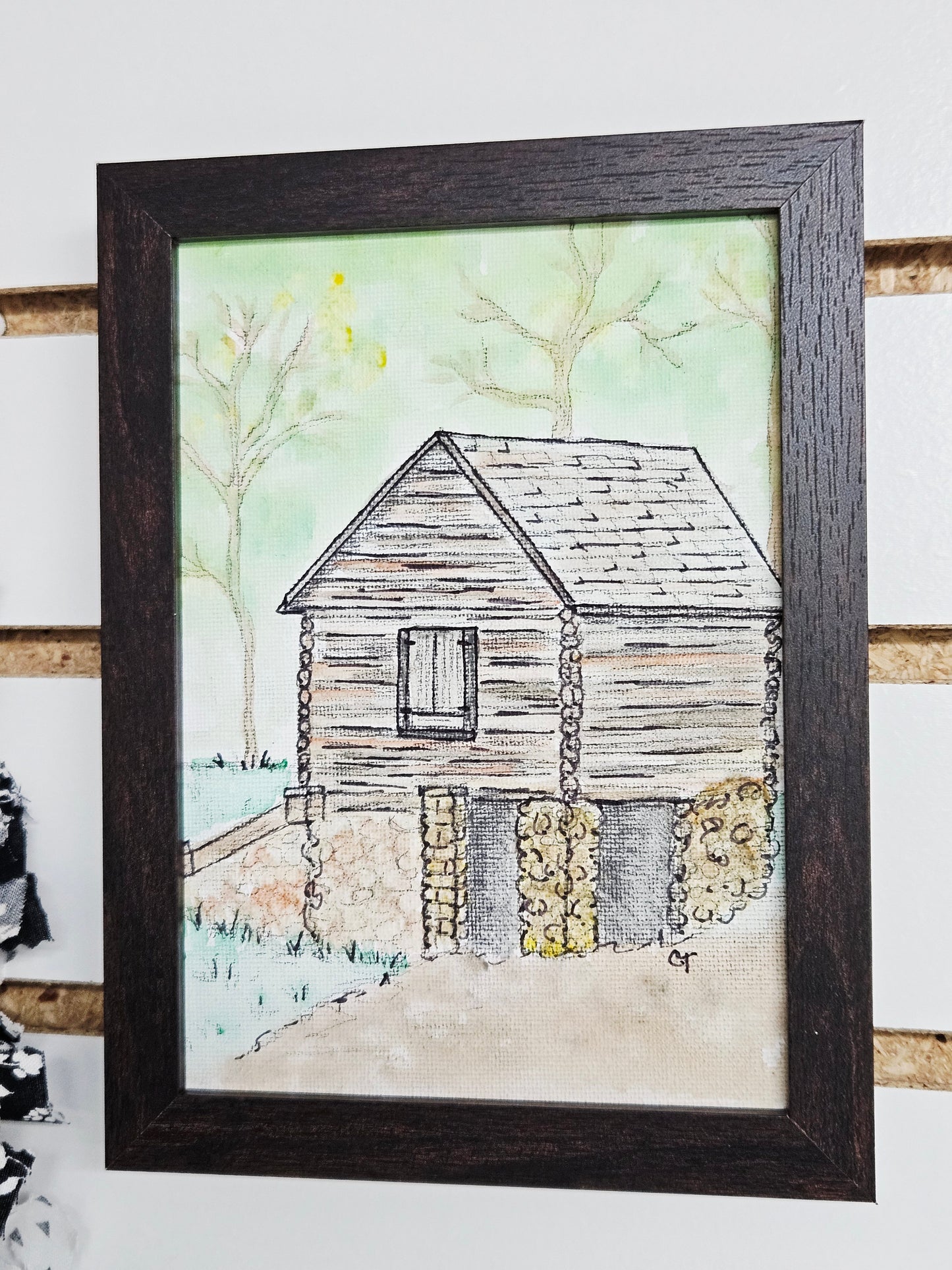 Framed Log Cabin Painting