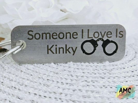 Someone I Love Is Kinky Metal Keychain